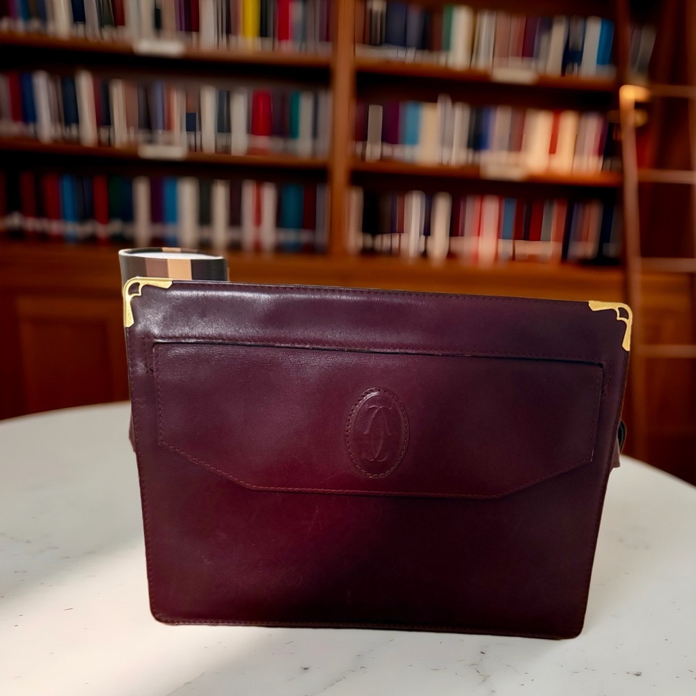 Cartier Burgundy Leather Wristlet with Gold Corner Accents in Fair Condition